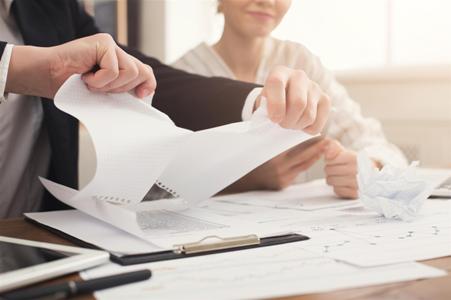 angry-businessman-tearing-up-a-document 451x300